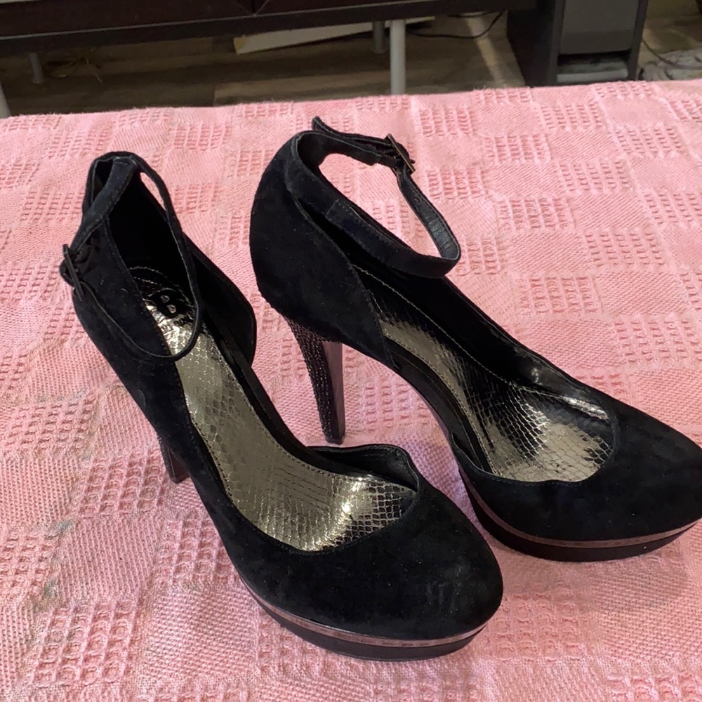 Black suede pumps
